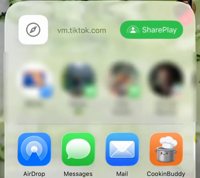 The iPhone share sheet opened from TikTok, with CookinBuddy in the row of apps